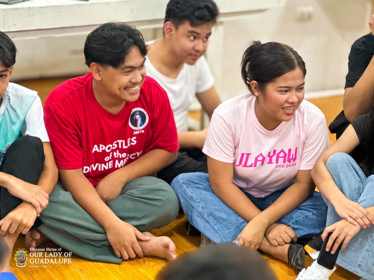 Young parish servants smiling during a group activity